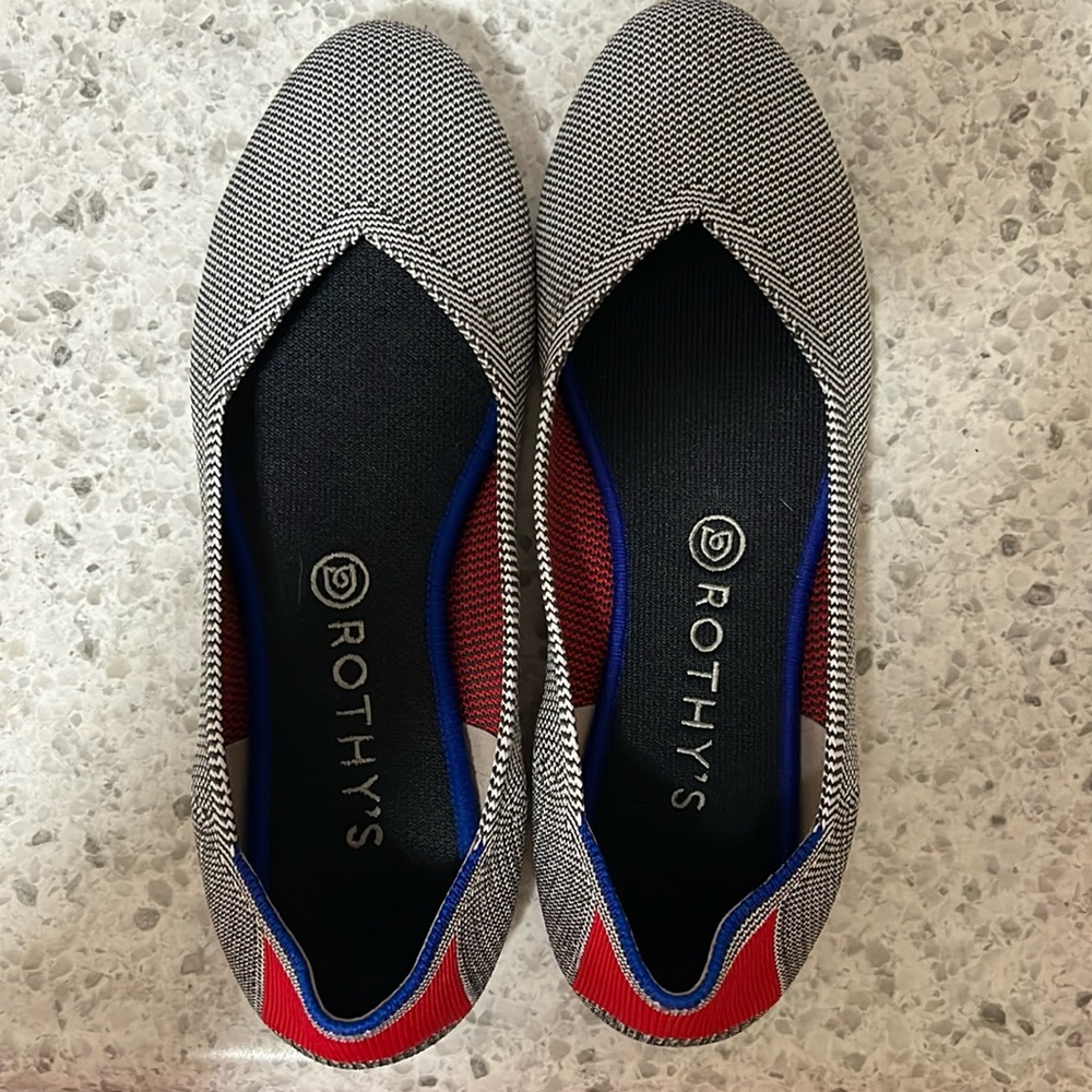 Rothy’s size 10 round toe flats. Blue pattern with red accent at back.
